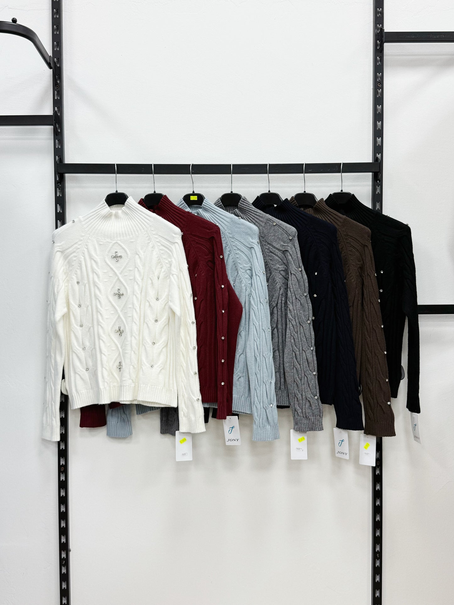 MAGLIERIA A LUPETTO A MANICHE LUNGHE CON ZIRCONI