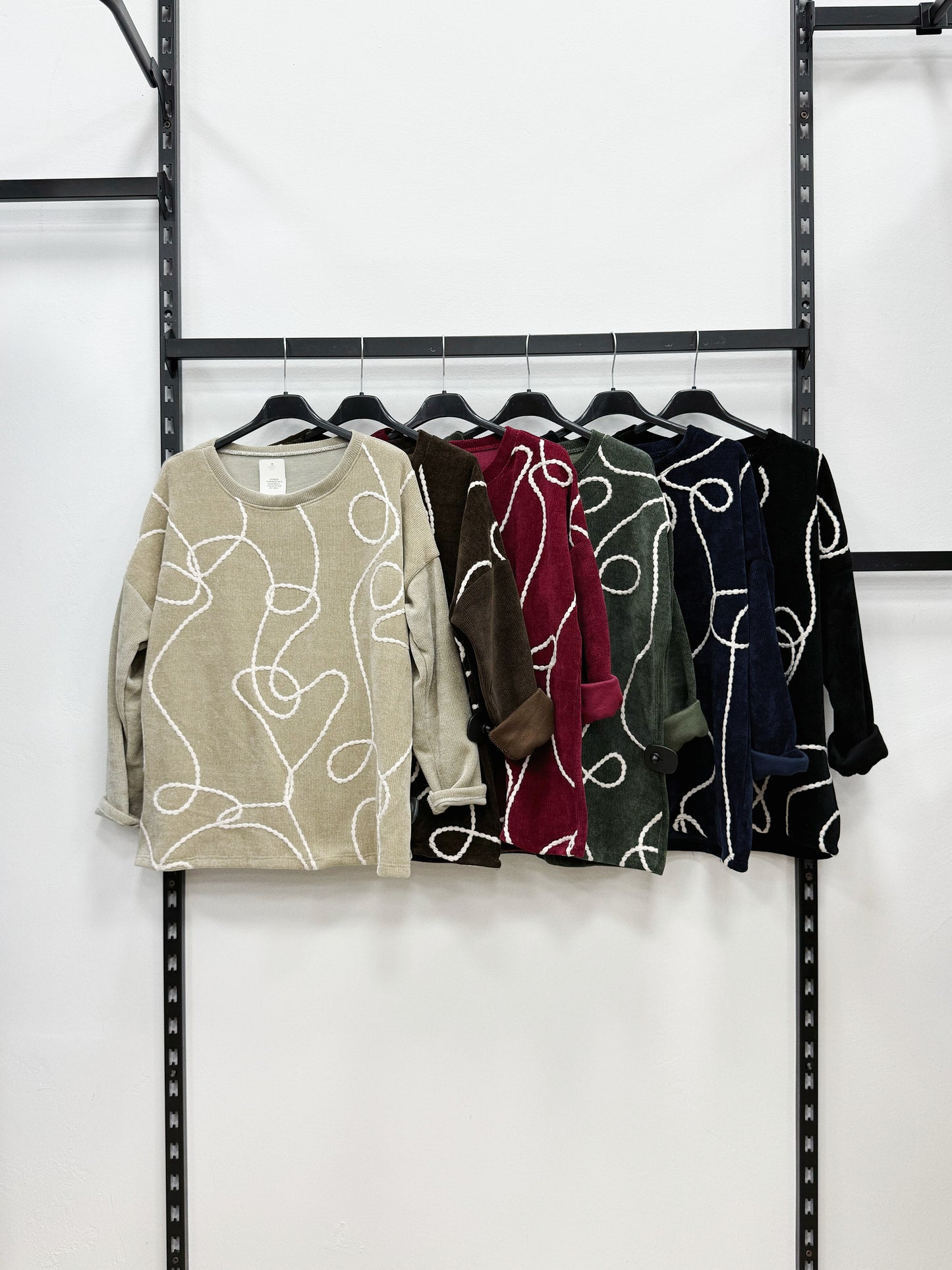 FELPA CON DISEGNI FILO