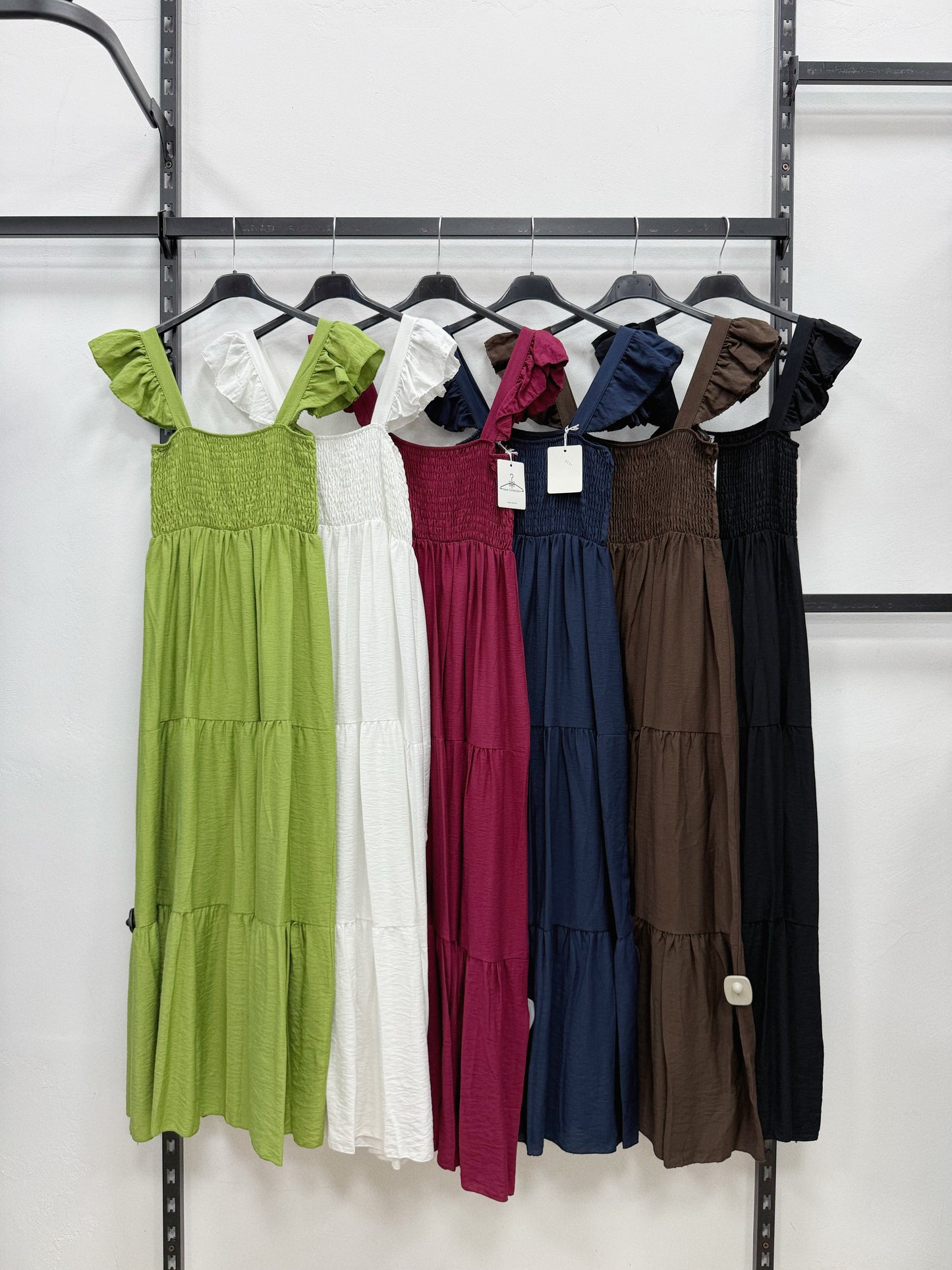 VESTITO LUNGO CON BRETELLE A COLANT A BALZE