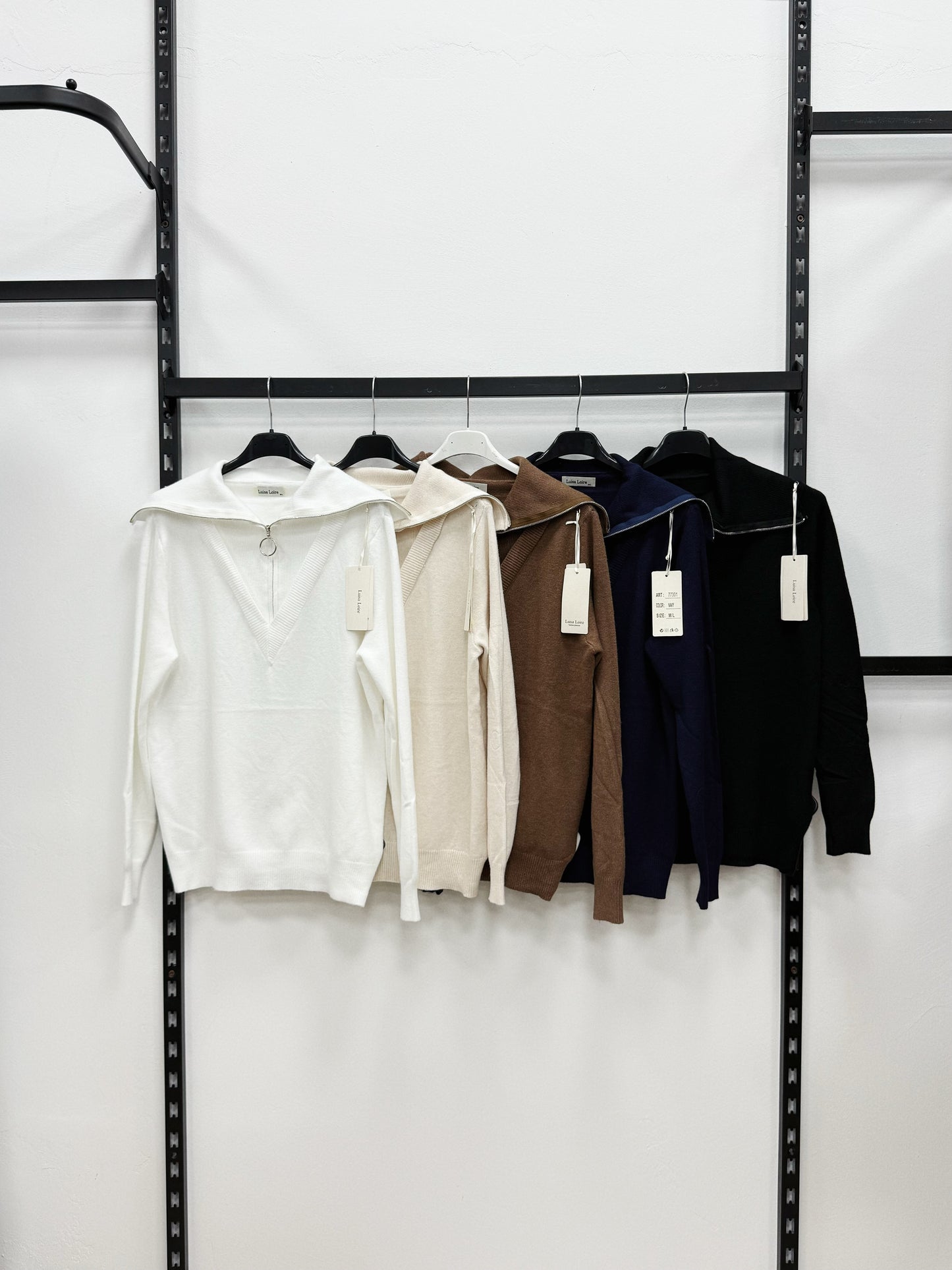 MAGLIERIA CON COLLETTA A MEZZA CERNIERA