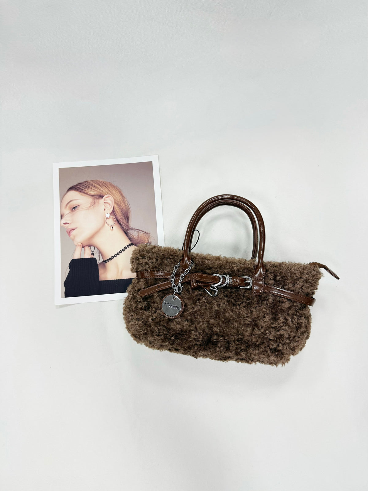 BORSA COCONUDA A LANA DI AGNELLO