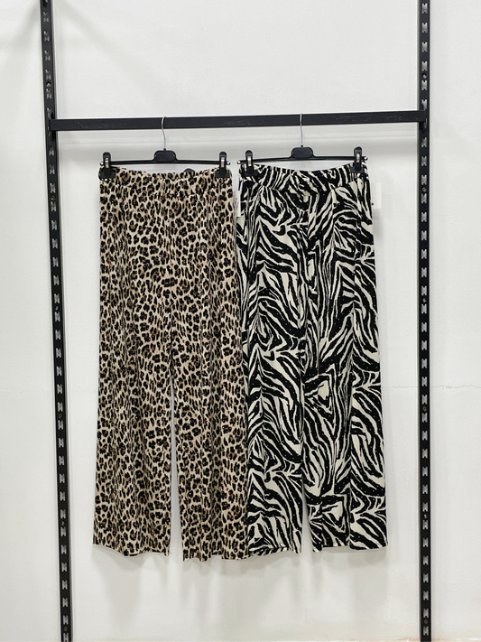 PANTALONE A GAMBA LARGA CON BRILLANTINI