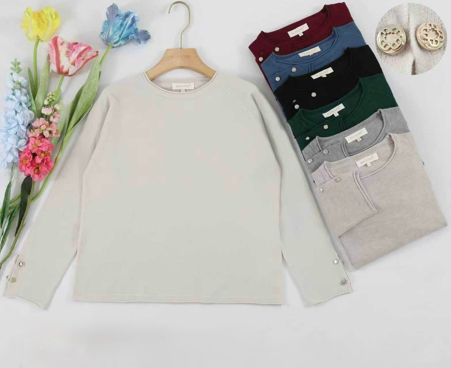 MAGLIERIA SUL POLSINO CON BOTTONI