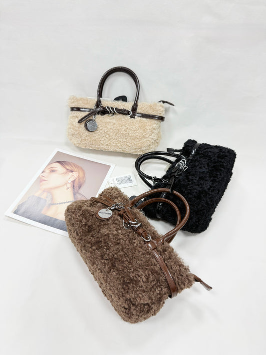 BORSA COCONUDA A LANA DI AGNELLO