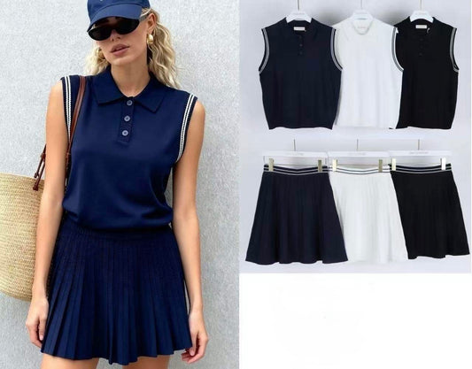 SET DI VISCOSA GILET A COLLO POLO E GONNA CORTA CON PIEGHE SVASATE