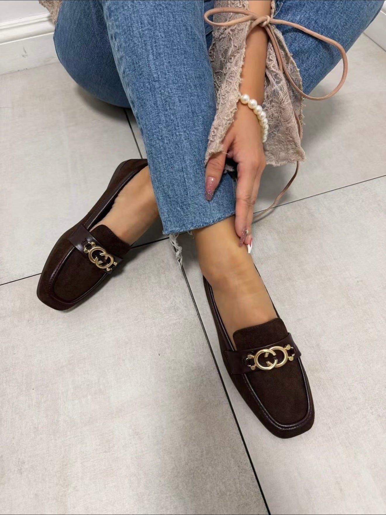 MOCASSINI DI CAMOSCIO CON LOGO METALLO